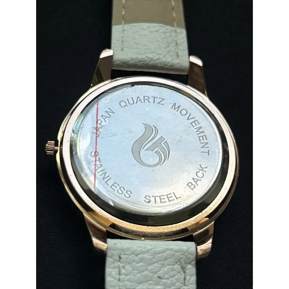 Rose Gold Tone White Dial And Band Women’s Quartz Watch